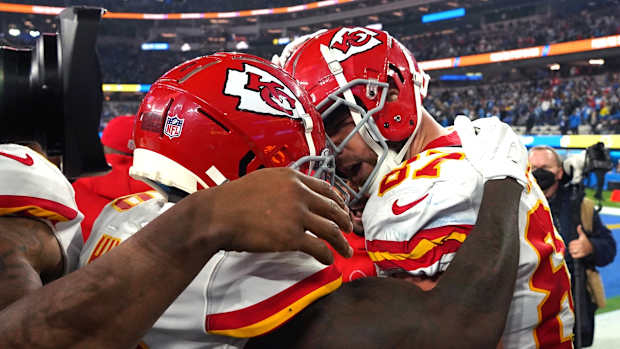 Dec 16, 2021; Inglewood, California, USA; Kansas City Chiefs tight end Travis Kelce (87) celebrates with wide receiver Tyreek Hill (10) after scoring a touchdown in overtime against the Los Angeles Chargers at SoFi Stadium. Mandatory Credit: Kirby Lee-USA TODAY Sports